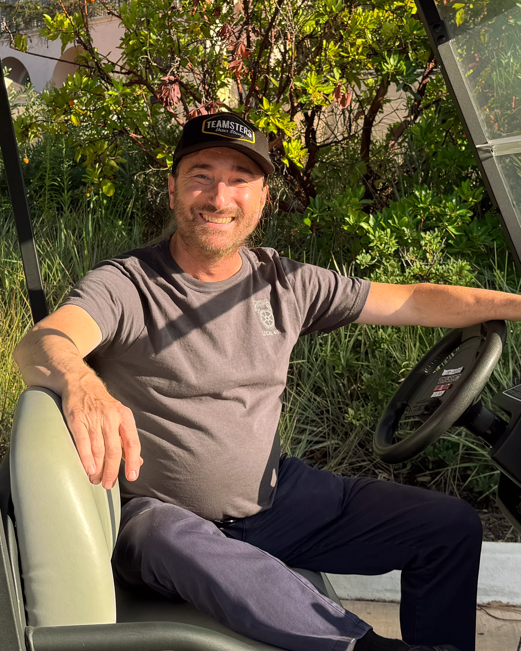 Portrait of Samuel “Sam” Forest smiling at the San Diego Zoo.